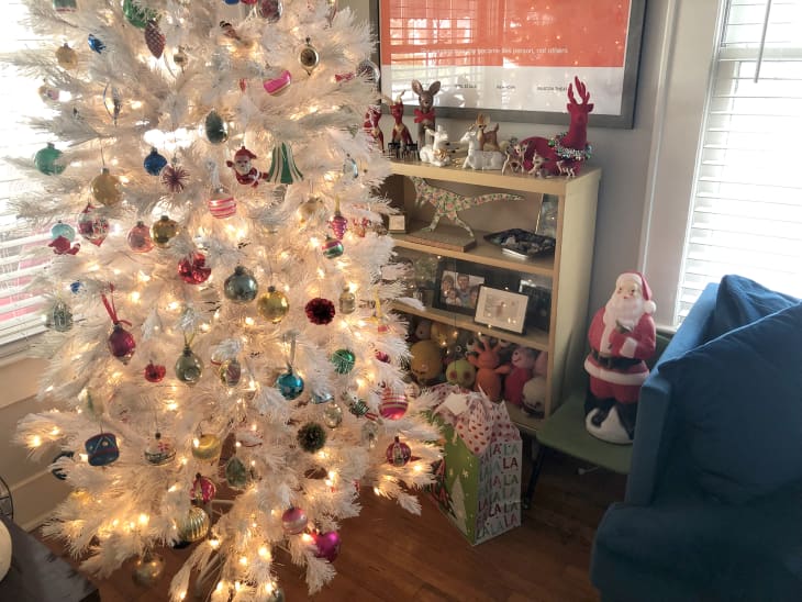 White tree store with colored lights
